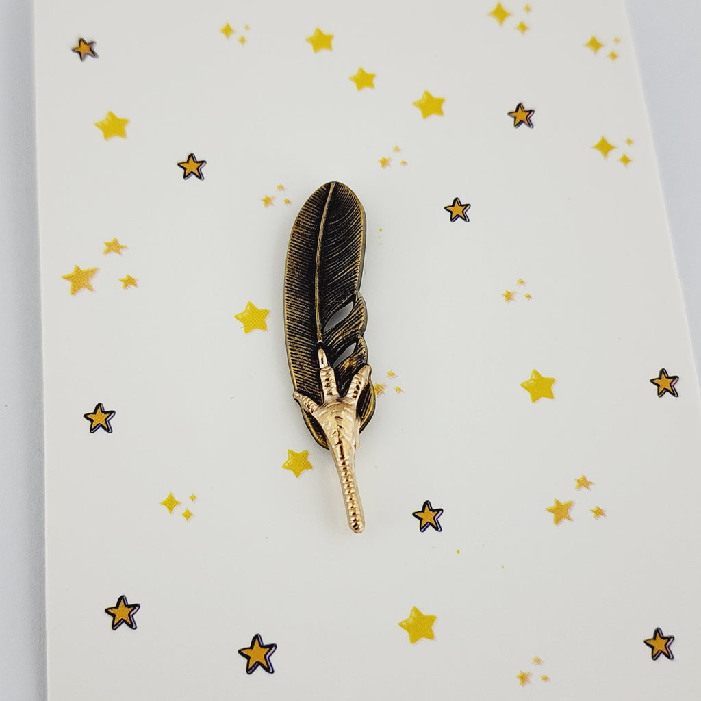 FEATHER & FANG LAPEL PIN