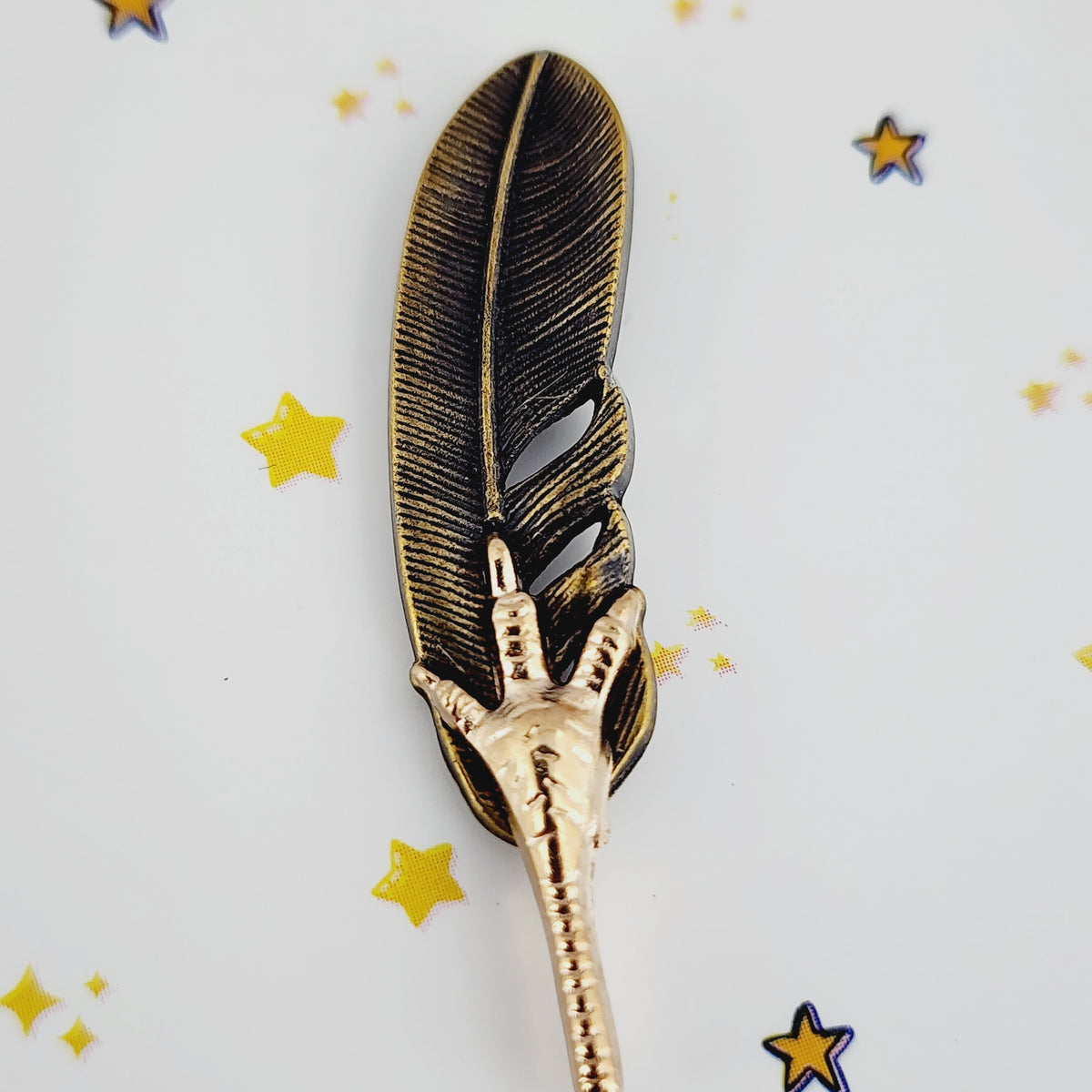 FEATHER & FANG LAPEL PIN