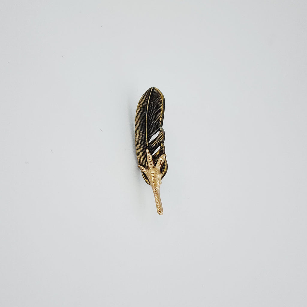 FEATHER & FANG LAPEL PIN