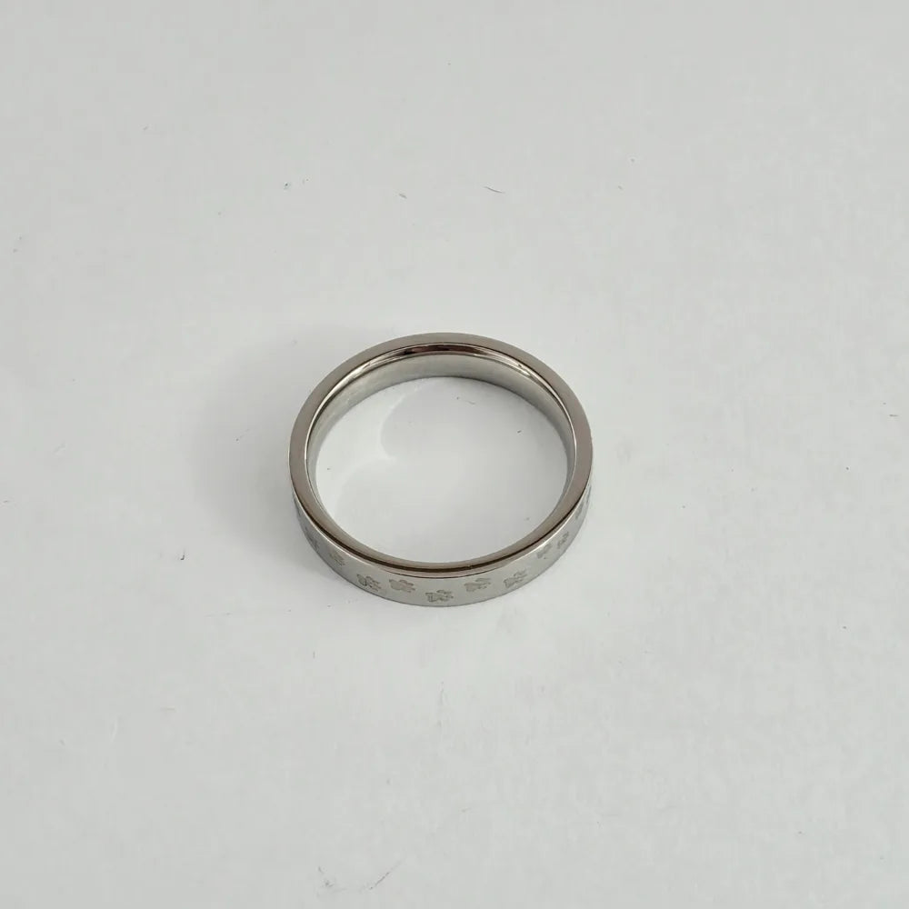 PAW PRINT ELEGANCE STAINLESS STEEL TIE RING
