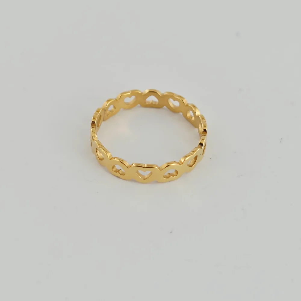 GOLDEN HEARTS STAINLESS STEEL TIE RING