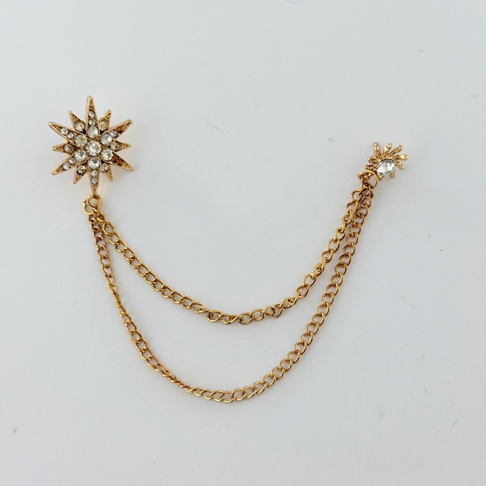 ROYAL STARBURST CHAIN BROOCH GOLDEN