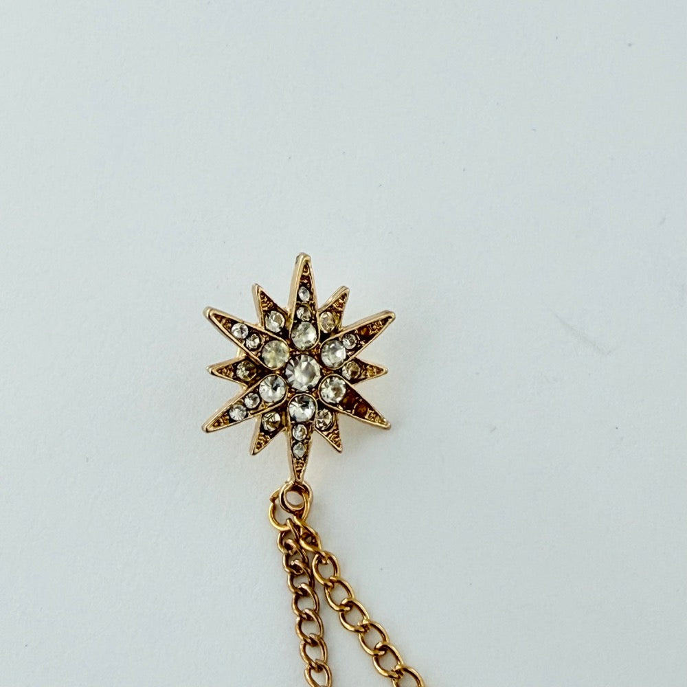 ROYAL STARBURST CHAIN BROOCH GOLDEN