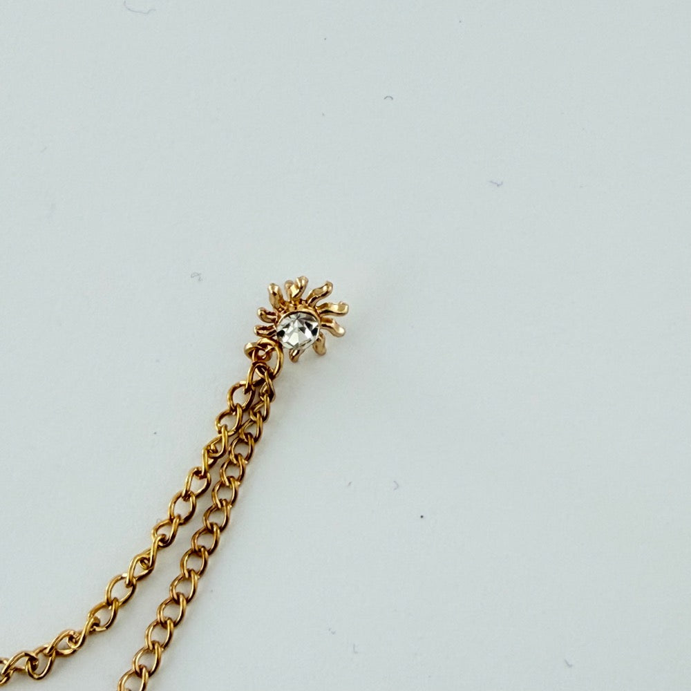 ROYAL STARBURST CHAIN BROOCH GOLDEN