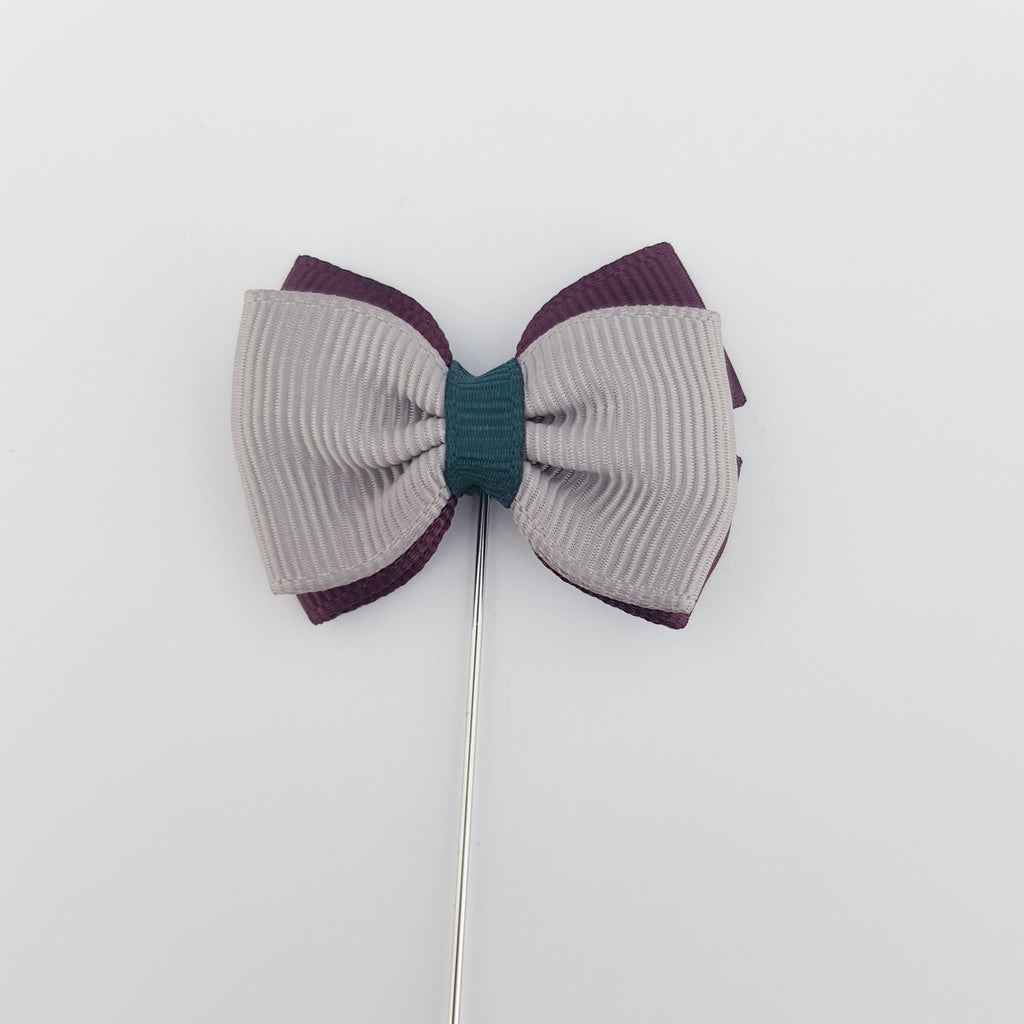 RIBBON TIE LAPEL PIN