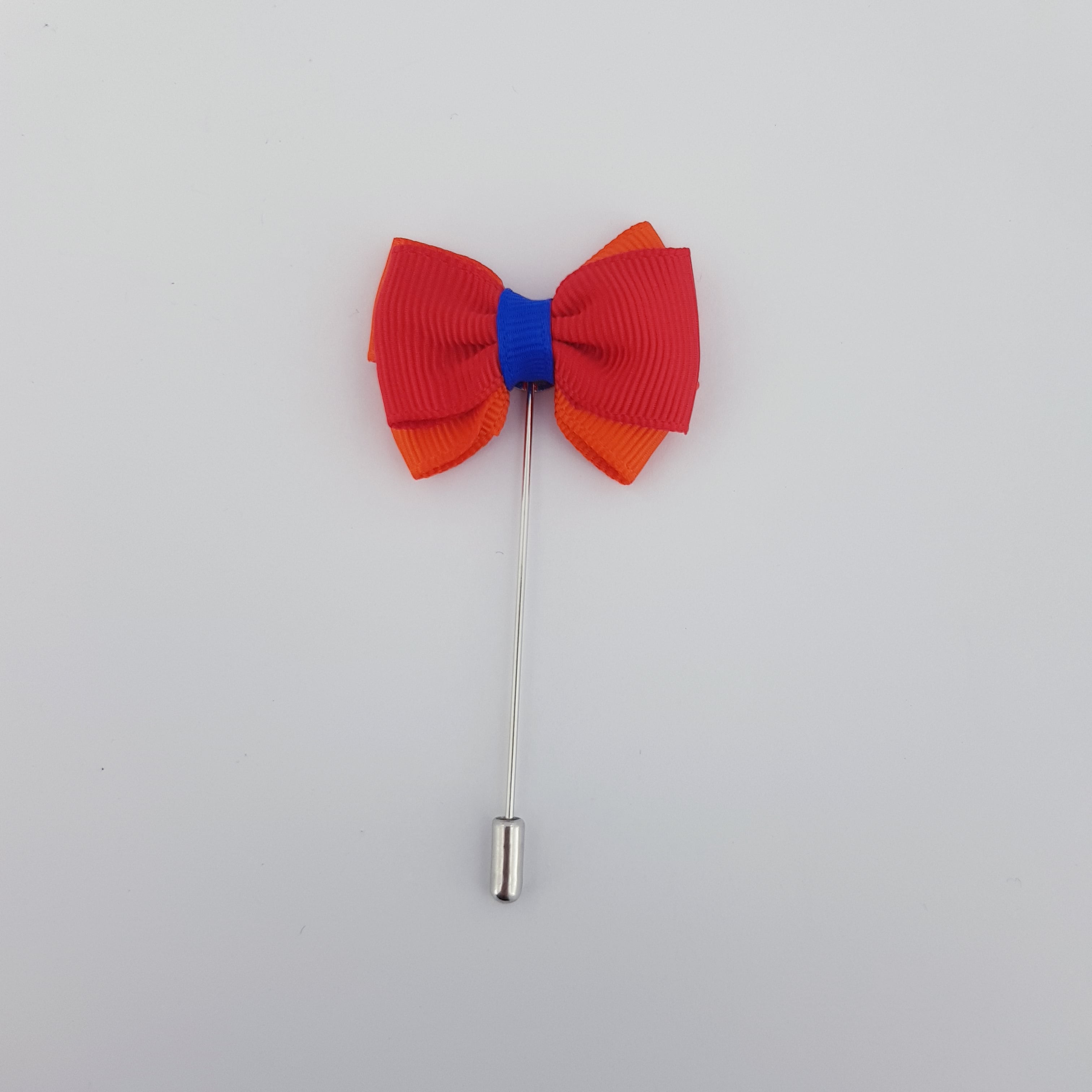 RIBBON TIE LAPEL PIN