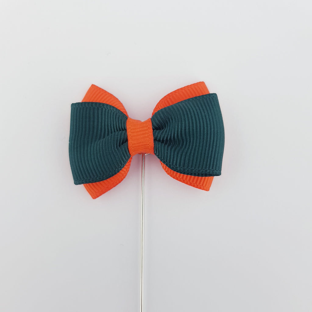 RIBBON TIE LAPEL PIN