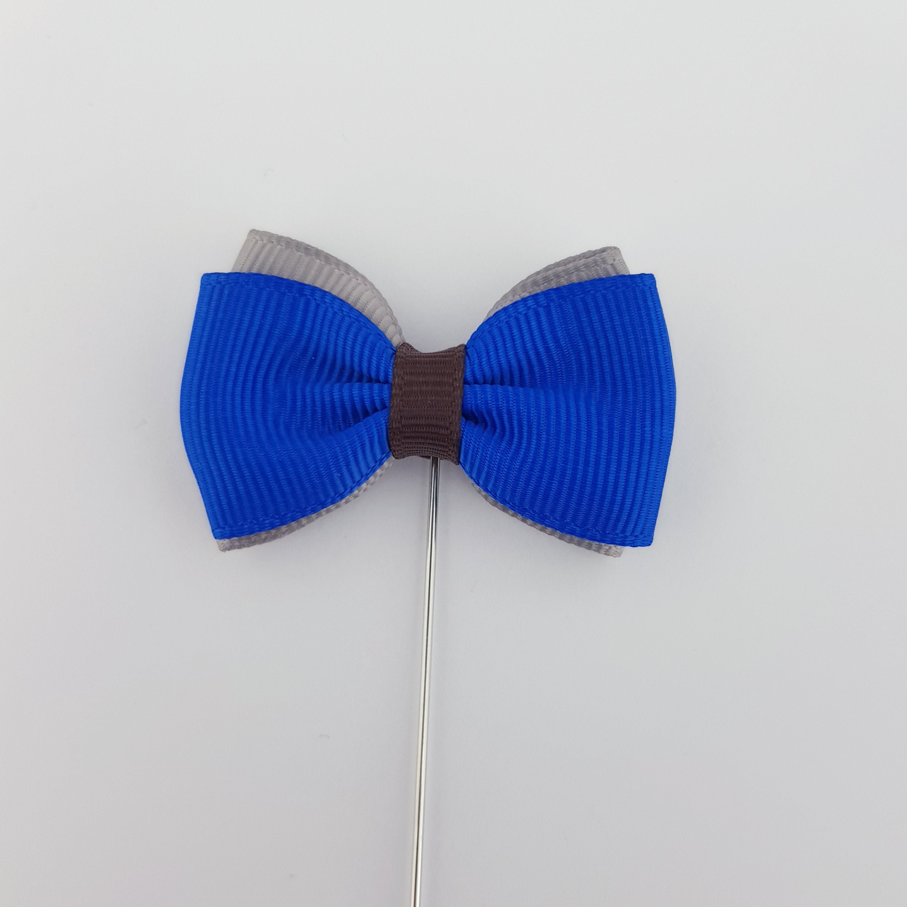 RIBBON TIE LAPEL PIN